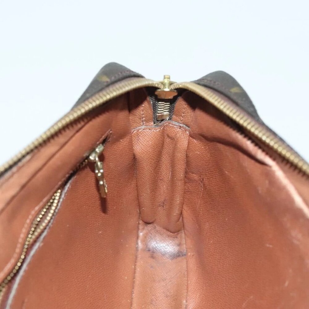 LOUIS VUITTON Monogram Marly Dragonne GM Clutch Bag - Picture 12 of 16
